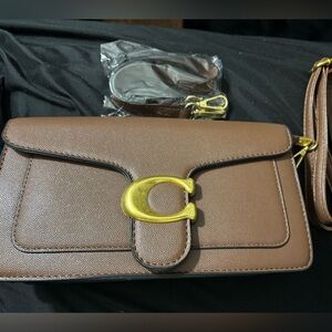 Coach Tan Clutch with Gold Accents